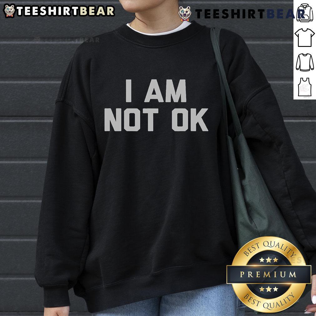 Cozy 'I Am Not Ok' sweatshirt featuring a casual design, perfect for comfort and expressing feelings in style.