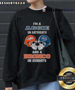 Cozy sweatshirt featuring 'Top I'm a Uggie on Saturdays and a Bronco on Sundays' design, perfect for sports fans.