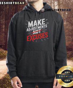 Motivational hoodie featuring 'Make Adjustments, Not Excuses' design, perfect for hustle and discipline enthusiasts.