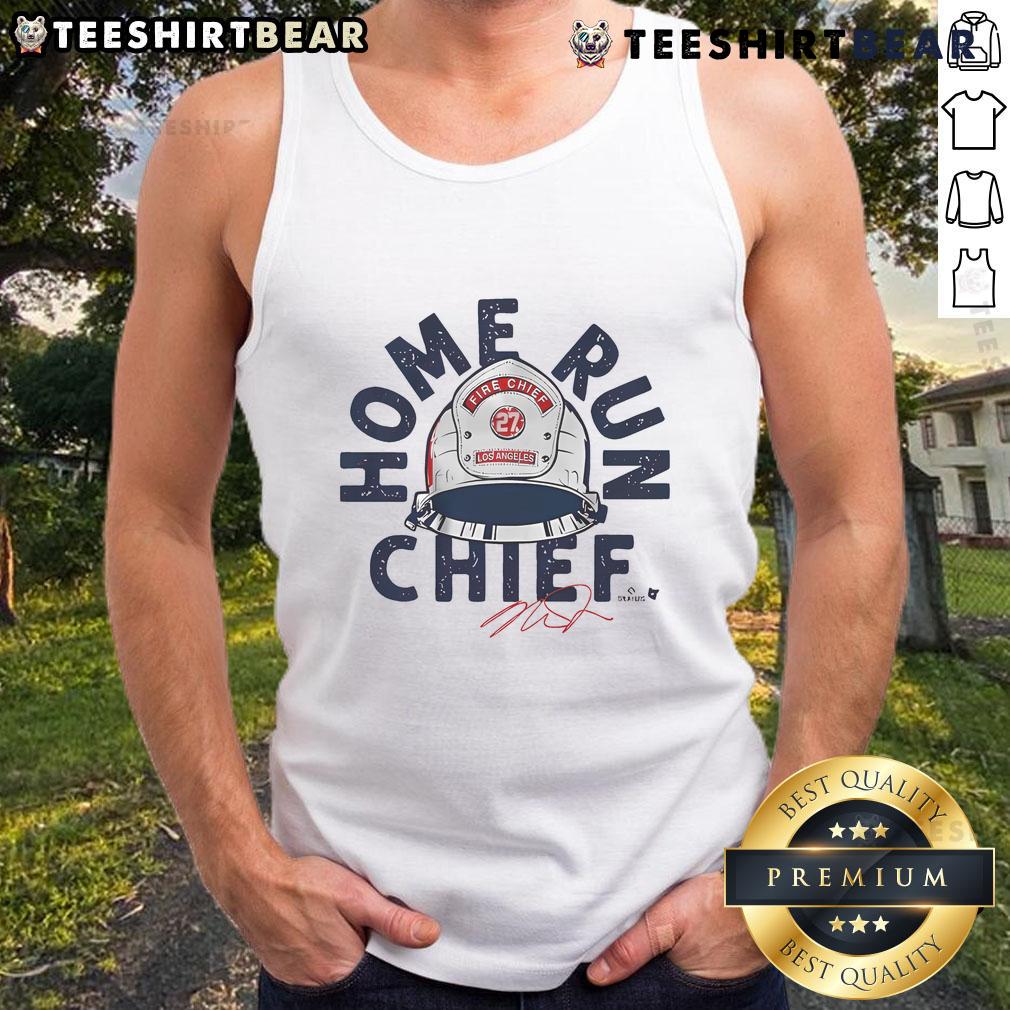 Mike Trout hitting a home run in a stylish Chief tank top, showcasing his athleticism and team spirit on the field.