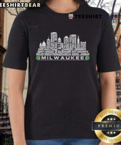 Milwaukee skyline with basketball legends graphic on a ladies tee, celebrating the top Milwaukee basketball team of all time.
