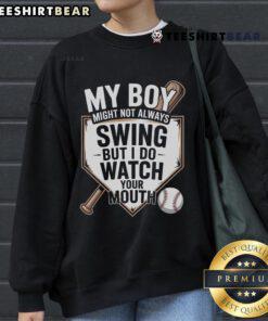 Alt Text: Top My Boy Might Not Always Swing Baseball Sweatshirt featuring a playful design, perfect for sports enthusiasts.