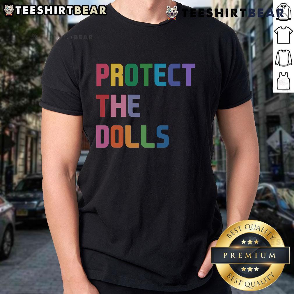 Top Protect The Dolls T-Shirt featuring a vibrant graphic design promoting doll safety and empowerment.
