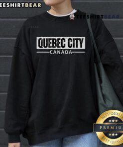 Vintage retro sweatshirt featuring Quebec City, Canada design, perfect for travelers and fashion enthusiasts.