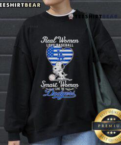 Top real women love baseball: Smart women love the Dodgers sweatshirt featuring Snoopy hugging a heart.