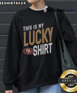 Alt Text: Cozy sweatshirt featuring San Francisco 49ers logo, perfect for game day and showcasing team spirit.