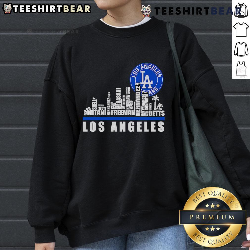 Los Angeles Dodgers players name logo sweatshirt featuring a stylish top skyline design.