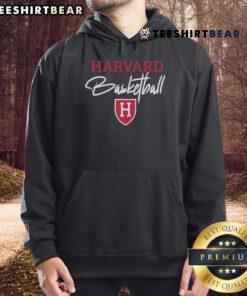 Steve Kerr wearing a Harvard basketball hoodie, showcasing his support for college basketball and team spirit.