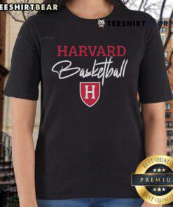 Steve Kerr wearing a Harvard Basketball ladies tee, showcasing his support for women's sports and basketball fashion.