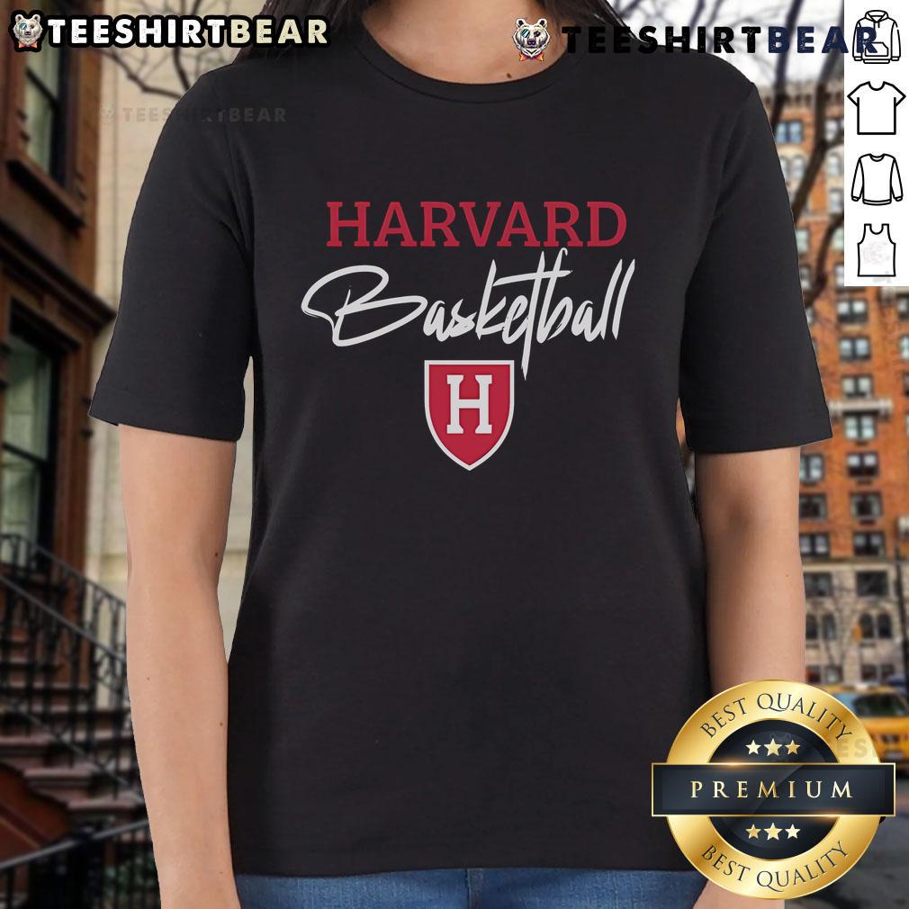 Steve Kerr wearing a Harvard Basketball ladies tee, showcasing his support for women's sports and basketball fashion.