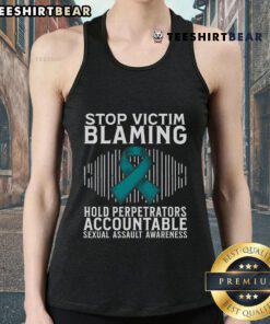Teal ribbon tank top with 'Stop Victim Blaming' message, promoting sexual assault awareness and support for survivors.