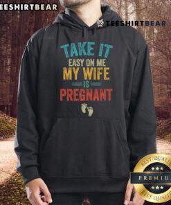 Vintage hoodie featuring 'Take It Easy On Me, My Wife Is Pregnant' design, perfect for expectant fathers and casual wear.