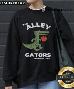 Top The Alley Gators Bowling Team Sweatshirt featuring vibrant team colors and logo, perfect for bowling enthusiasts.