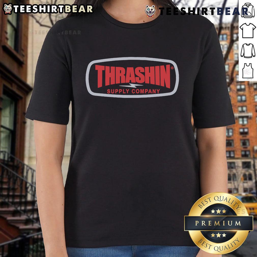 Alt Text: Top Thrashin Supply Company badge on a stylish ladies tee, perfect for casual wear and showcasing unique style.
