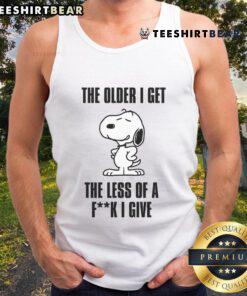 Awesome Snoopy tank top featuring 'The Older I Get, The Less Of A F*ck I Give' slogan in bold graphic design.
