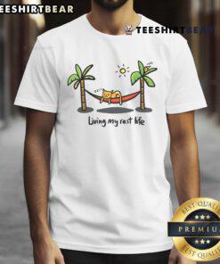 Cute cat living my rest life t-shirt featuring an adorable feline lounging, perfect for cat lovers and comfy style.
