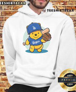 Alt Text: Cute Winnie the Pooh wearing a LA Dodgers baseball hoodie, perfect for fans of Disney and MLB apparel.