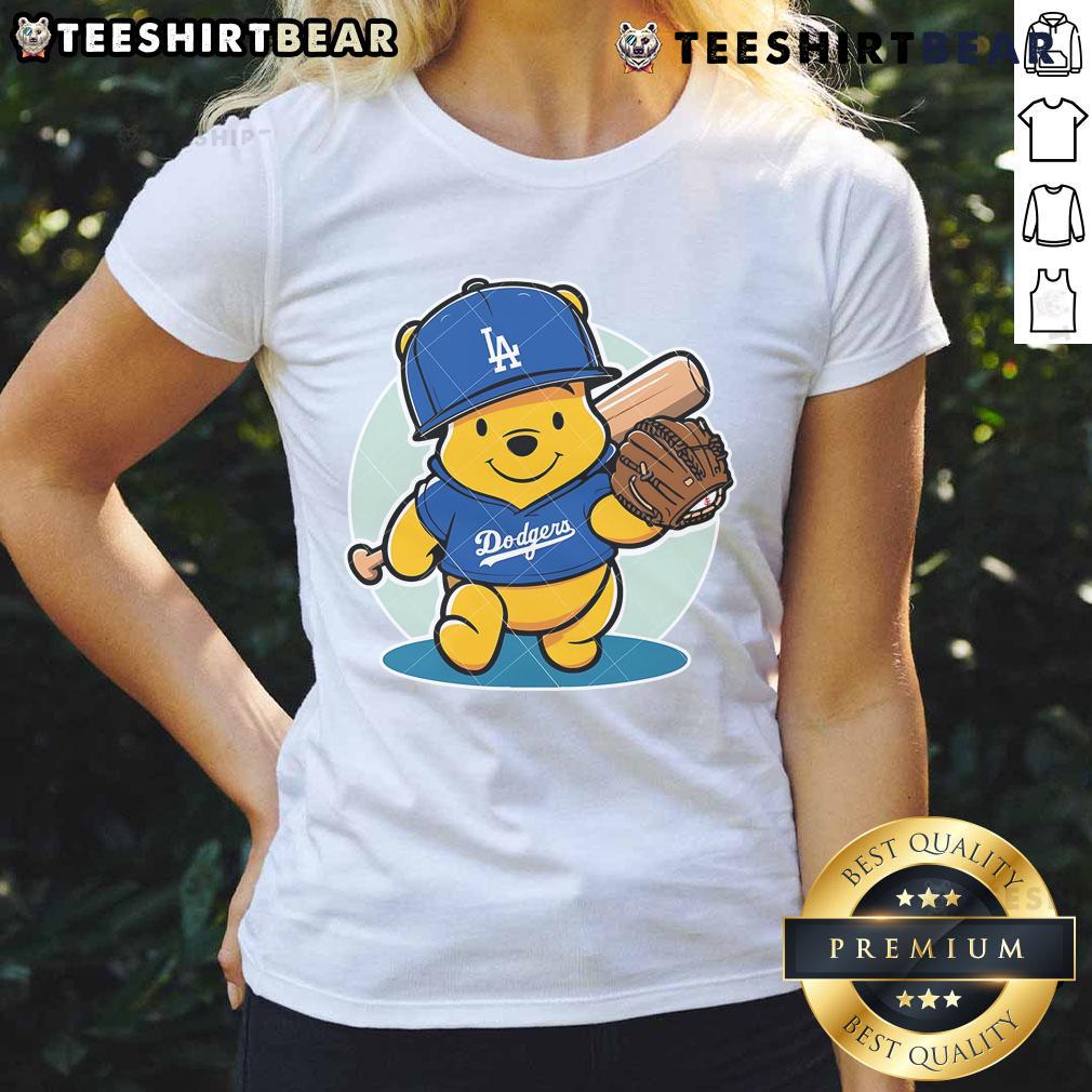 Cute Winnie the Pooh LA Dodgers baseball ladies tee featuring playful design and team colors for fans.