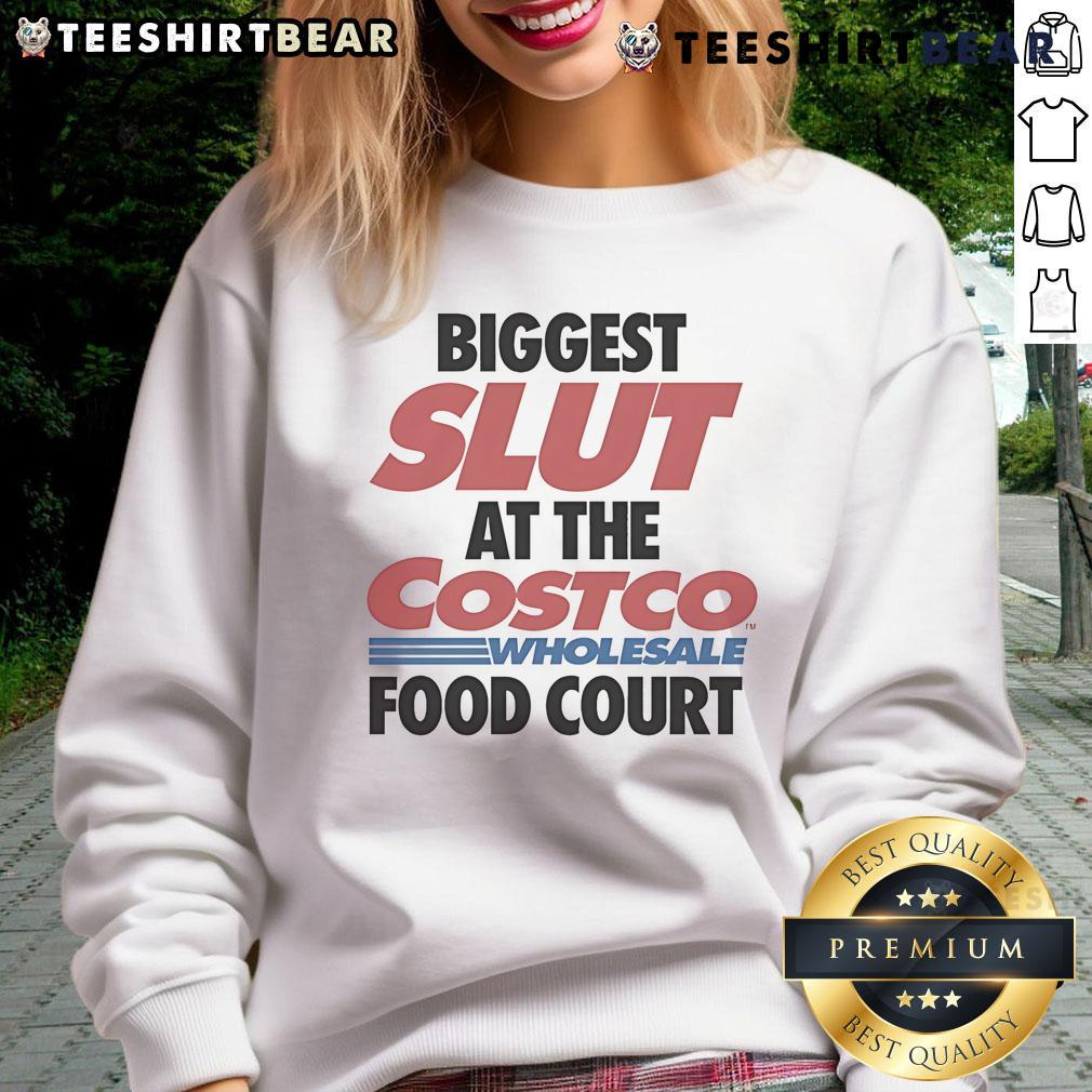 Funny sweatshirt reading 'Biggest Slut at the Costco Wholesale Food Court' displayed on a model at a food court.