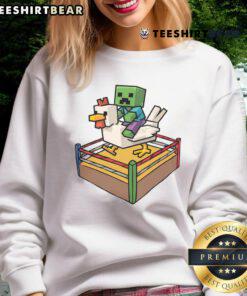 Funny Fighting Chicken Minecraft Chicken Jockey Sweatshirt featuring a vibrant design of a chicken riding a player.