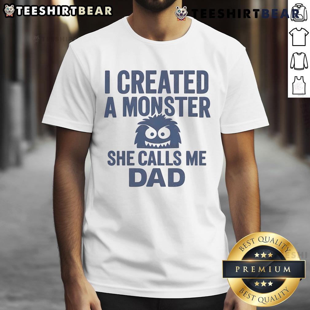 Funny 'I Created A Monster She Calls Me Dad' T-shirt featuring playful graphics, perfect for dads with a sense of humor.