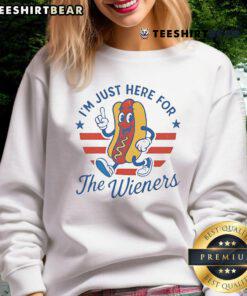 Funny 'Im Just Here for the Wieners' 4th of July sweatshirt featuring a hot dog design for festive celebrations.