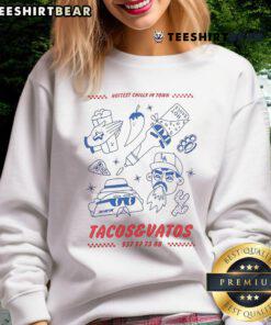 Alt Text: Good American Socks Tacos Vatos hottest chili in town sweatshirt featuring vibrant design and cozy fabric.