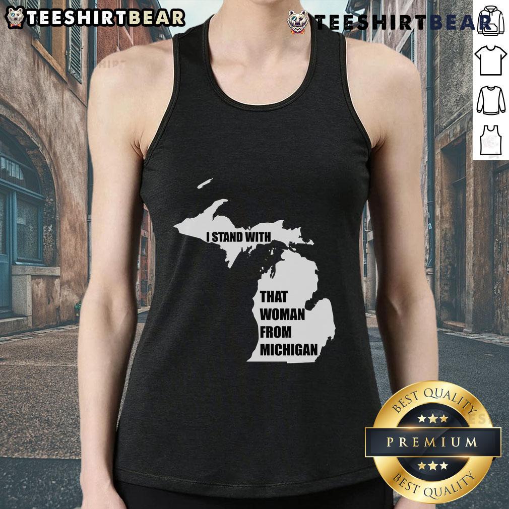Alt Text: Woman wearing a 'Good I Stand With That Woman From Michigan' tank top, promoting solidarity and empowerment.
