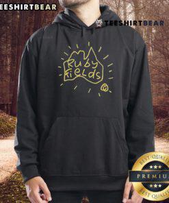 Cozy Good Ruby Fields Australia hoodie displayed on a rustic wooden background, showcasing vibrant colors and style.