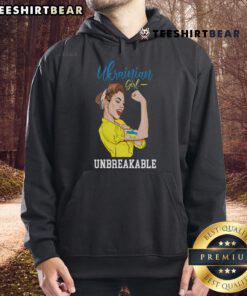 Ukrainian girl in a messy bun wearing a Ukraine hoodie, proudly showing the Ukrainian flag. Good Ukraine Girl spirit!