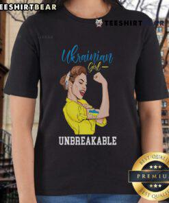Ukrainian girl with a messy bun wearing a Ukraine ladies tee, proudly displaying the Ukrainian flag.