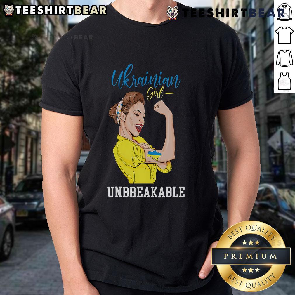 Ukrainian girl in a messy bun wearing a Ukraine flag t-shirt, showcasing pride and style with a vibrant design.