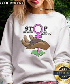 Hot Stop Hurting Our Women Sweatshirt in bold lettering, promoting awareness and support for women's rights and safety.