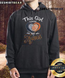 Girl wearing a Detroit Tigers hoodie with a heart fingerprint design, showcasing her love for the team.