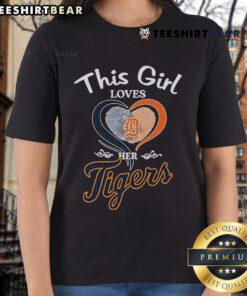Girl wearing a Detroit Tigers heart fingerprint tee, showcasing her love for the team in a stylish and fun way.