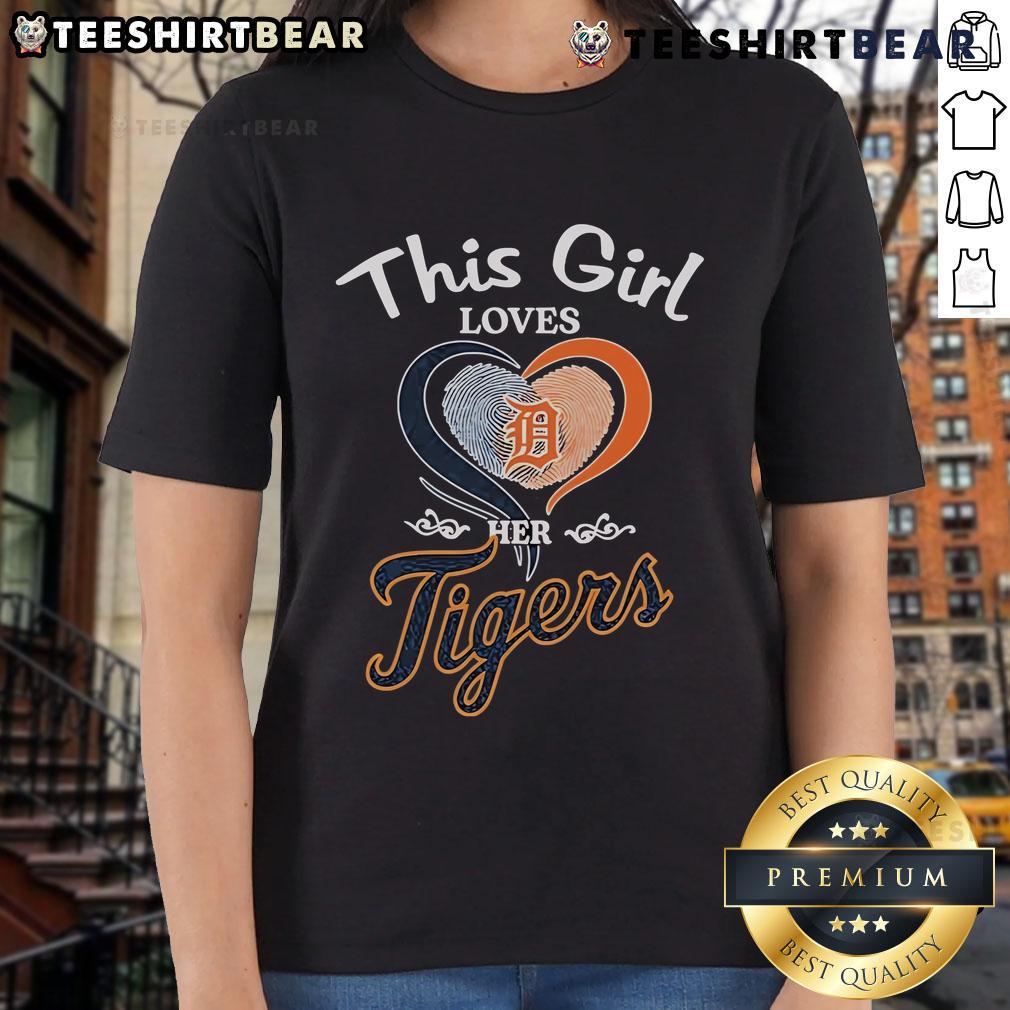 Girl wearing a Detroit Tigers heart fingerprint tee, showcasing her love for the team in a stylish and fun way.