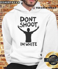 Nice Don't Shoot I'm White Hoodie worn by a person in a casual urban setting, promoting peace and awareness.
