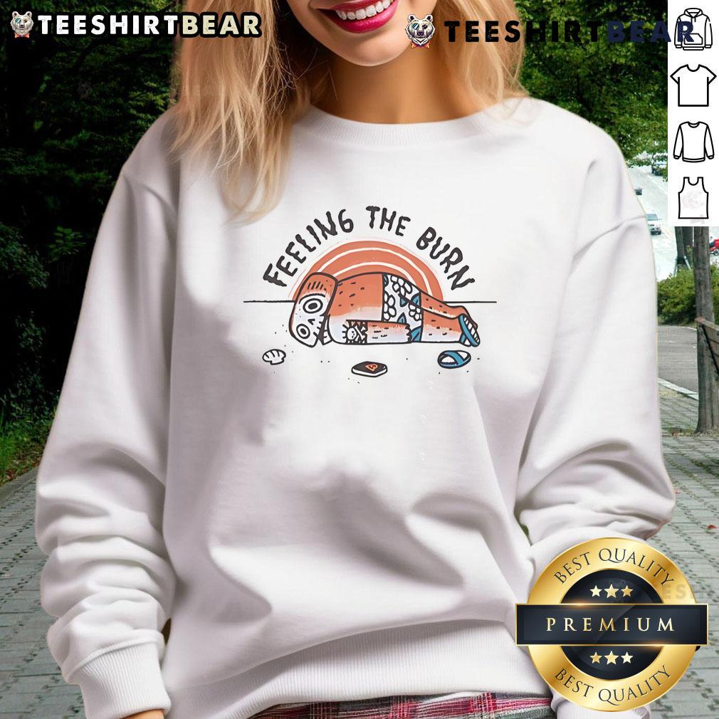 Cozy sweatshirt featuring 'Nice Feeling the Burn' design, perfect for beach days and sunburn recovery.