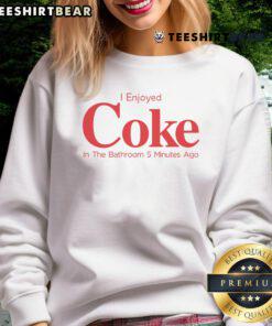 Cozy sweatshirt with 'I Enjoyed Coke in the Bathroom' text, perfect for casual wear and fun conversations.