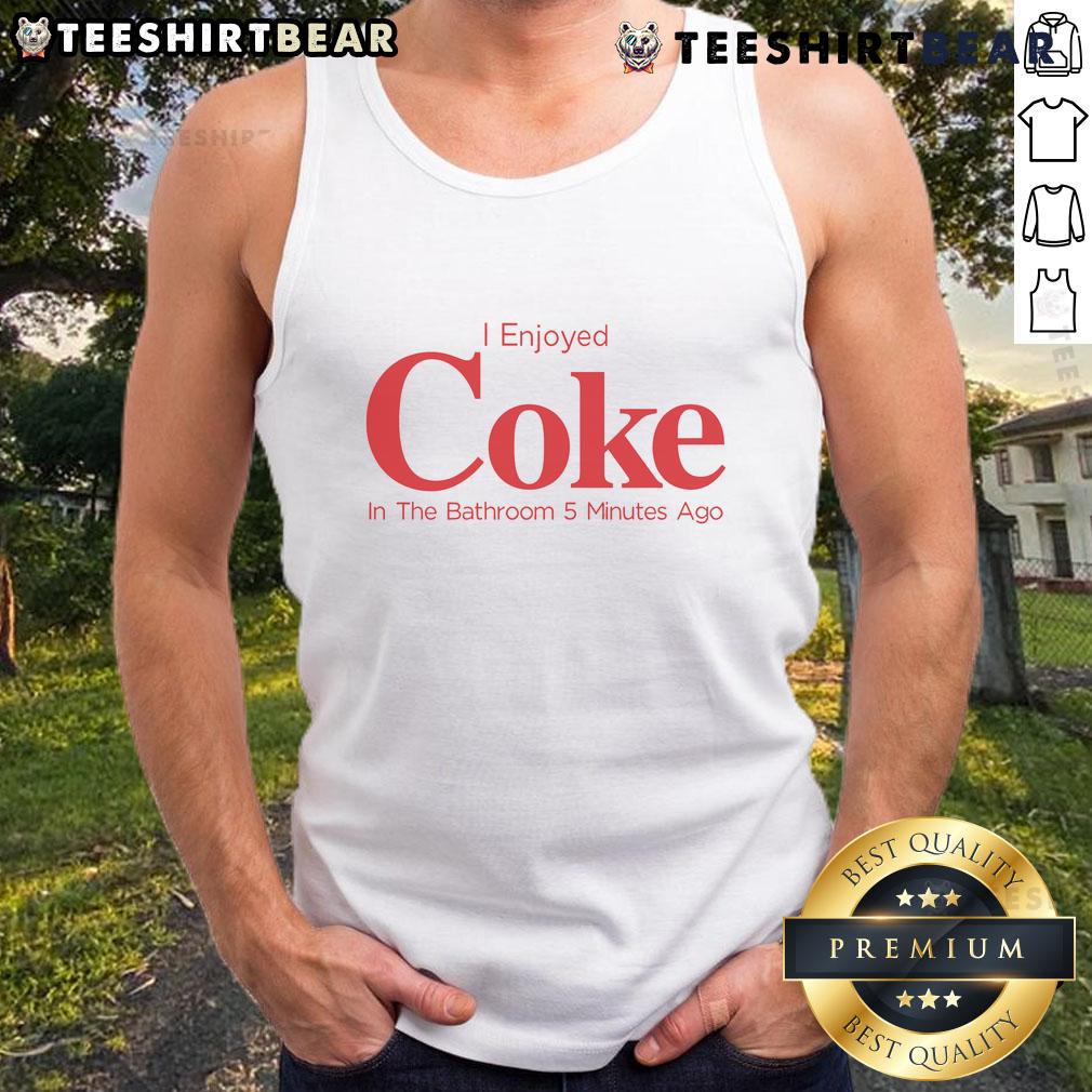 Person in a tank top enjoying a Coke in the bathroom, capturing a relaxed moment from 5 minutes ago.