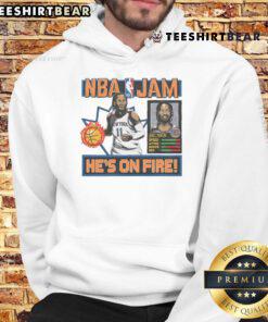Alt Text: Jalen Brunson wearing a stylish Knicks hoodie inspired by NBA Jam, showcasing vibrant colors and team spirit.