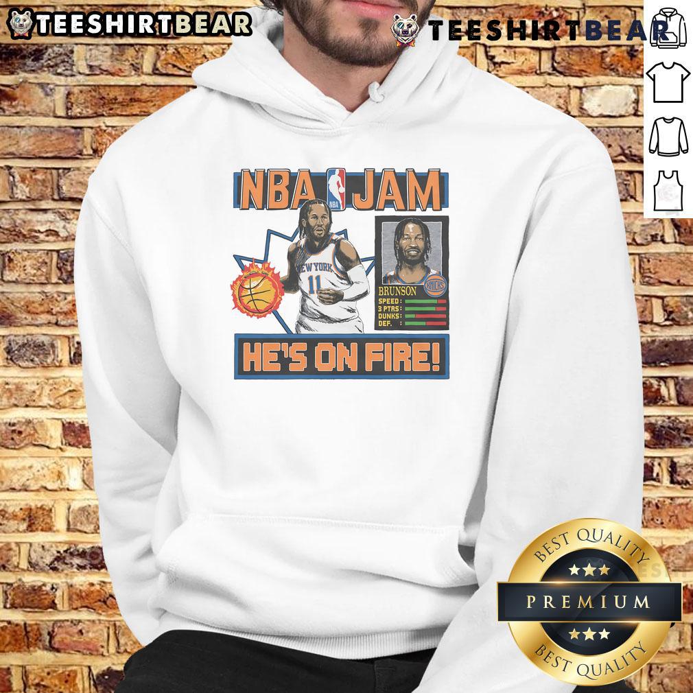 Alt Text: Jalen Brunson wearing a stylish Knicks hoodie inspired by NBA Jam, showcasing vibrant colors and team spirit.