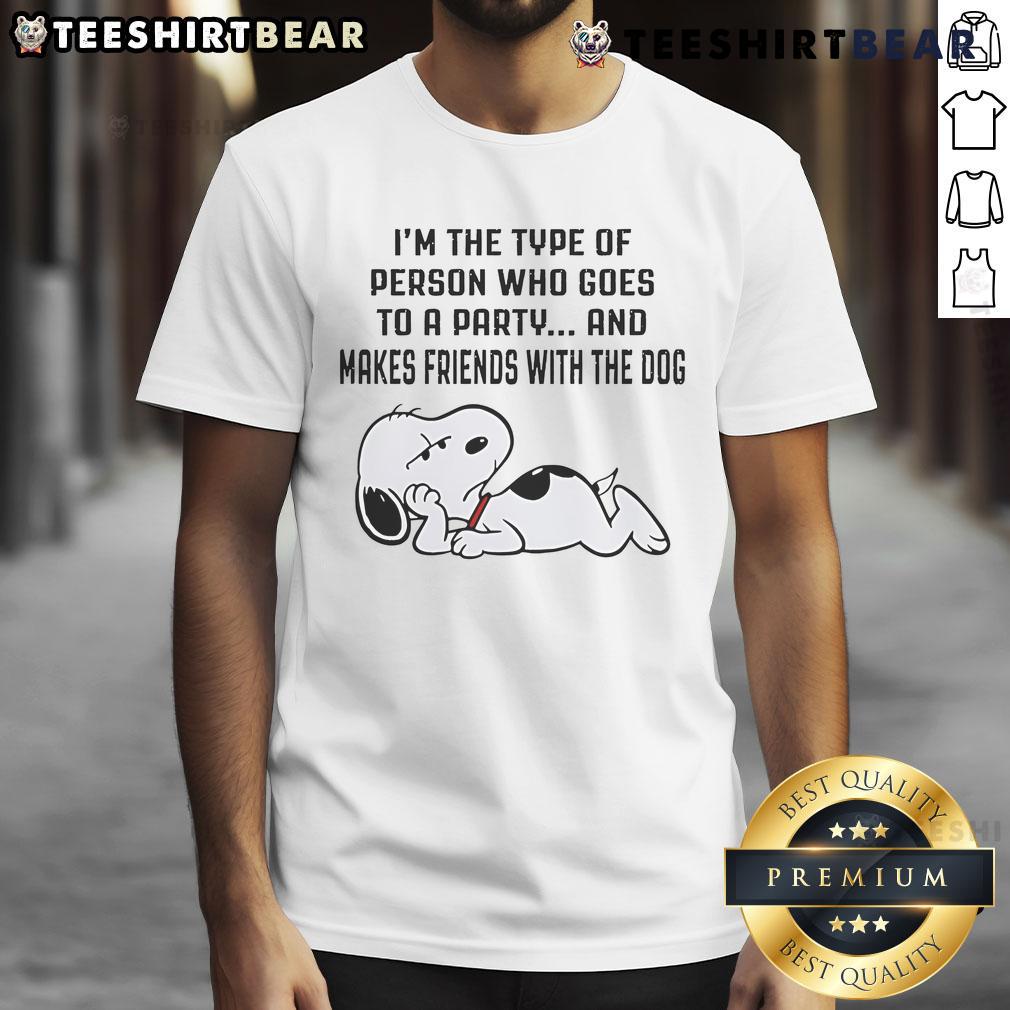 Alt Text: Snoopy graphic T-shirt with text 'I'm The Type Of Person Who Goes To A Party And Makes Friends With The Dog'.