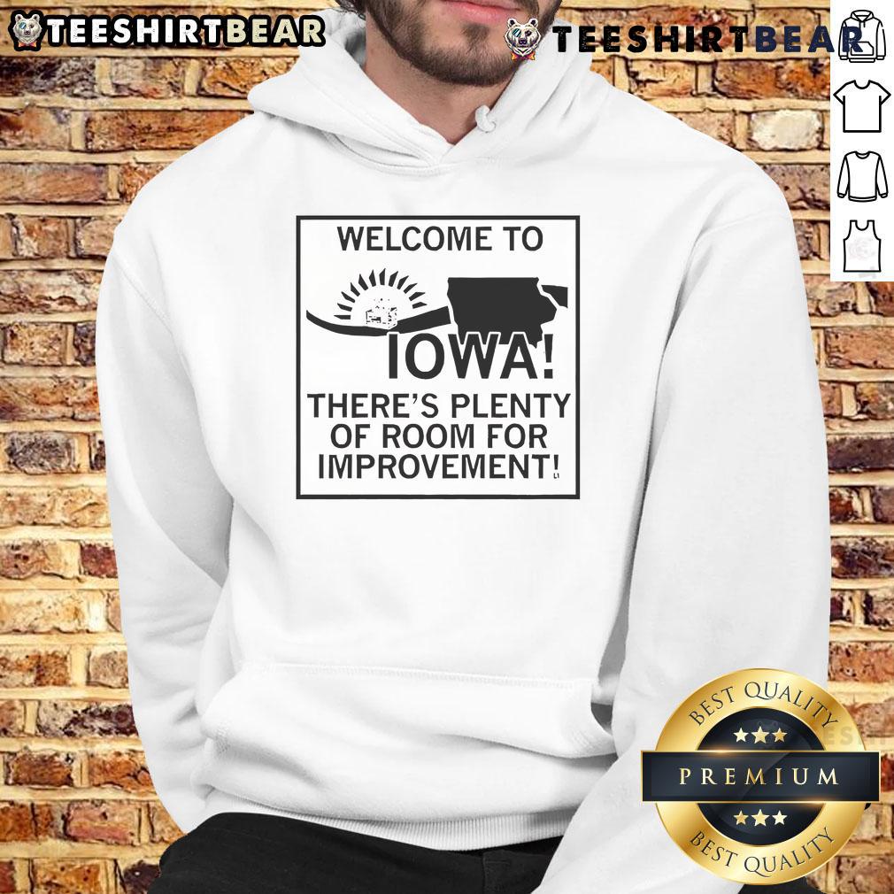 Cozy hoodie with 'Welcome to Iowa, There's Plenty of Room for Improvement' slogan, perfect for Iowa pride.
