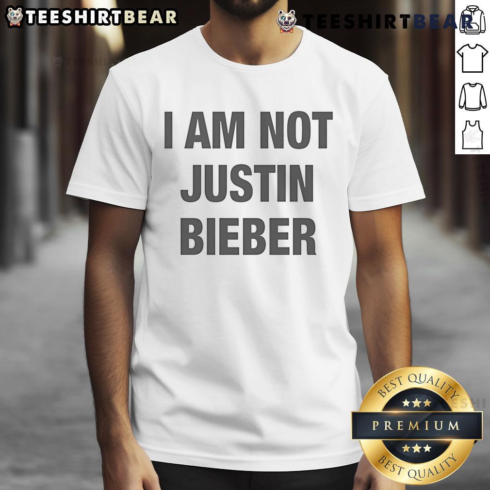 Alt Text: Official I Am Not Justin Bieber T-Shirt featuring bold graphics and a stylish design for fans and humor enthusiasts.