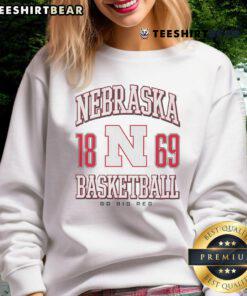Alt Text: Official Nebraska Cornhuskers basketball sweatshirt featuring the team logo, perfect for fans and warm-ups.