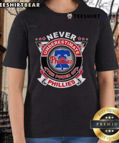 Alt Text: Official Phillies Ladies Tee featuring the slogan 'Never Underestimate The Power' in vibrant team colors.