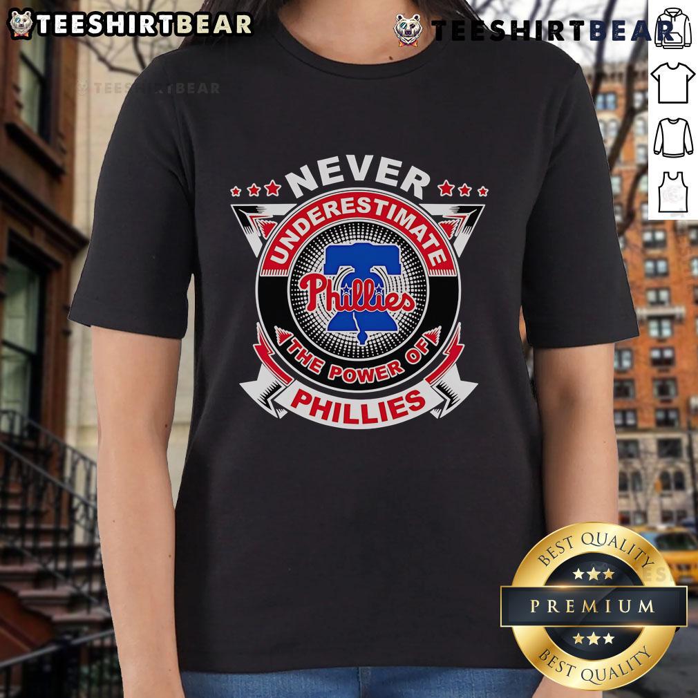 Alt Text: Official Phillies Ladies Tee featuring the slogan 'Never Underestimate The Power' in vibrant team colors.