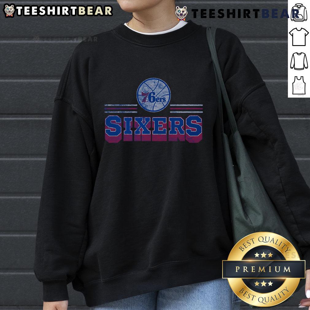Official Philadelphia 76ers fan banner sweatshirt featuring team colors and logo, perfect for showing support at games.