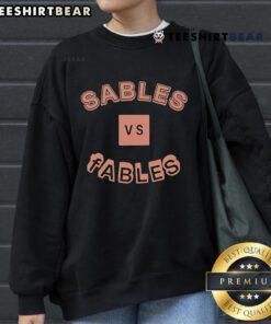 Official Sables Vs Fables Sweatshirt featuring a stylish design, perfect for fans of the Sables Vs Fables series.